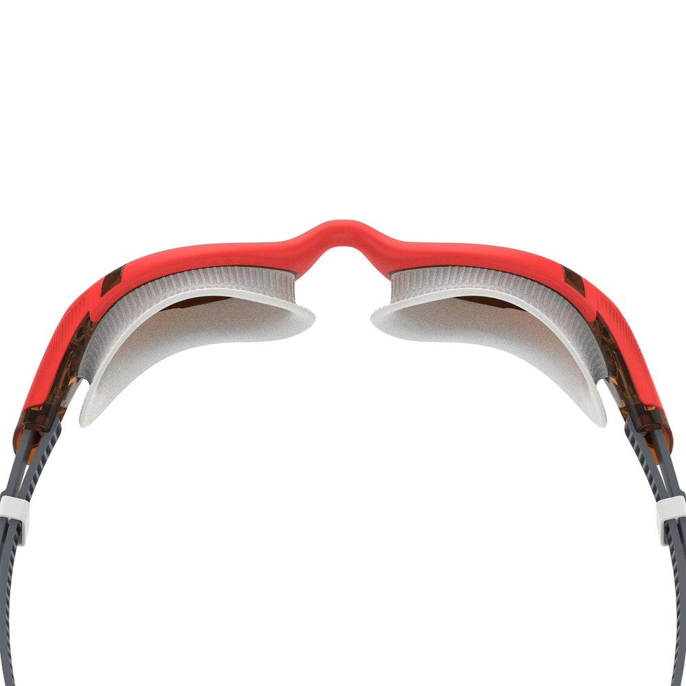 Speedo Biofuse 2.0 Heat Amber swimming goggles with tinted lenses and adjustable strap, designed for comfortable fit and clear underwater vision.