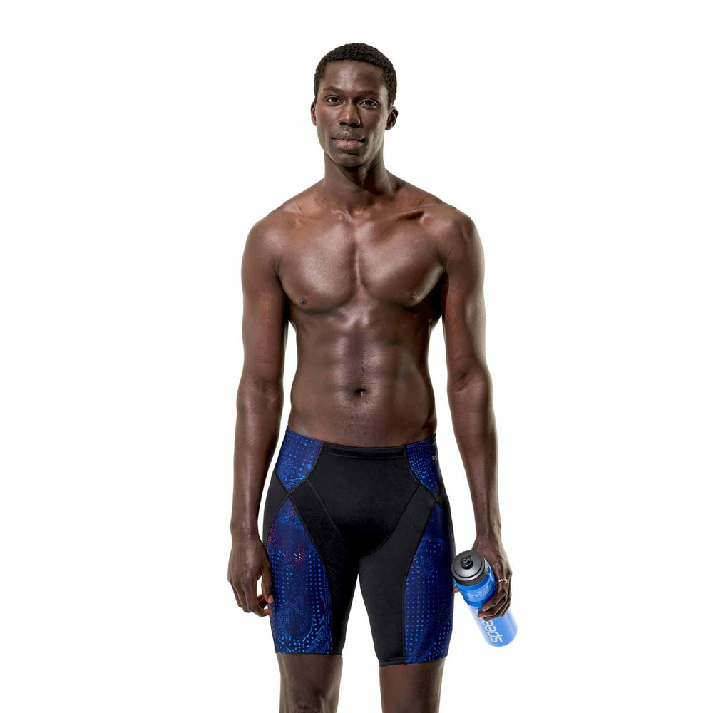 Speedo men's Endurance+ Max Compression Jammer in anthracite and peacoat, close-up of the fitted swimwear with logo detailing.