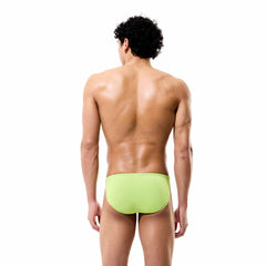 Speedo men's solid citrus green brief swimwear, snug fit with elastic waistband and streamlined design.