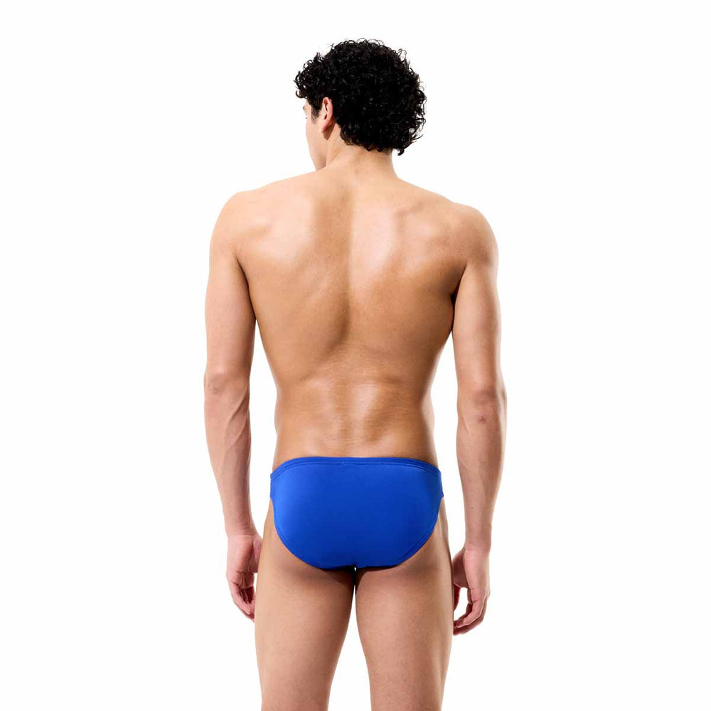 Speedo men's solid brief in calm cobalt blue, showcasing a fitted swimwear style with a sleek, comfortable waistband.