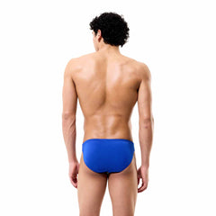 Speedo men's solid brief in calm cobalt blue, showcasing a fitted swimwear style with a sleek, comfortable waistband.