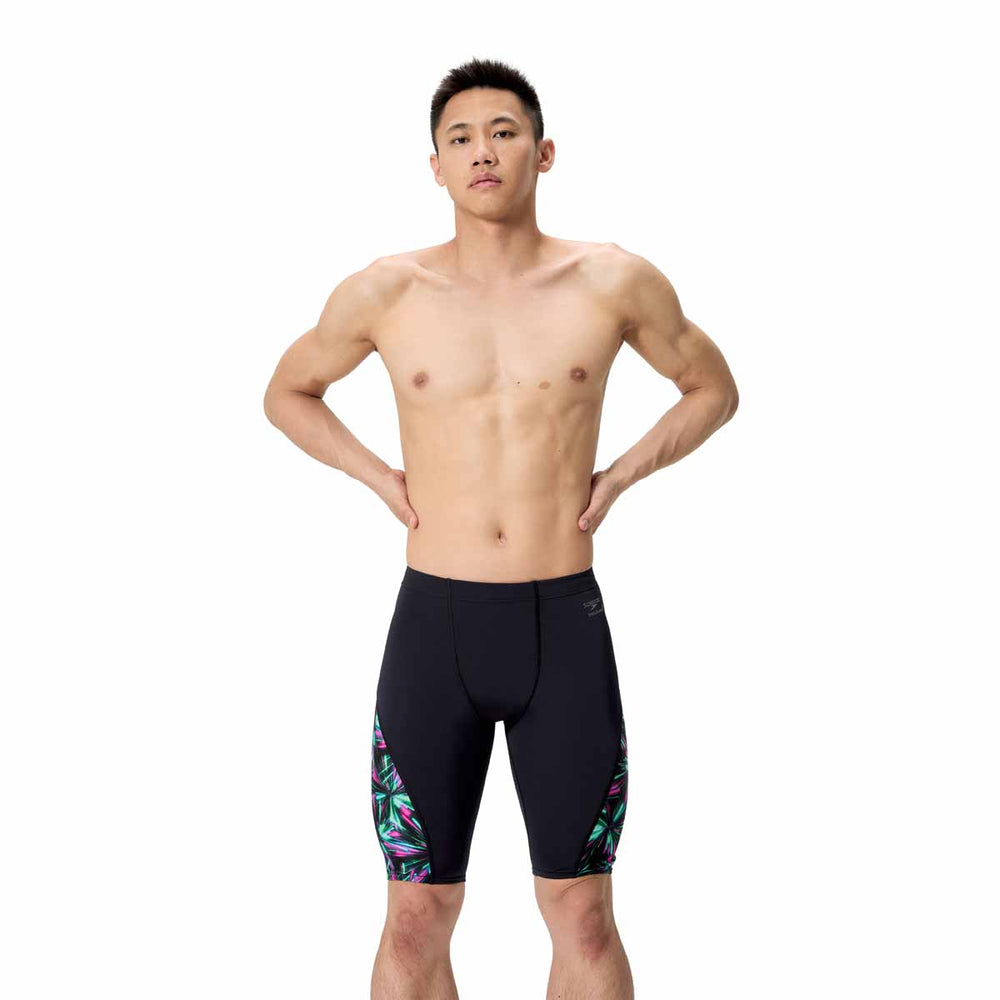 Speedo men's printed side spliced jammer featuring firework burst and black design, suitable for competitive swimming.