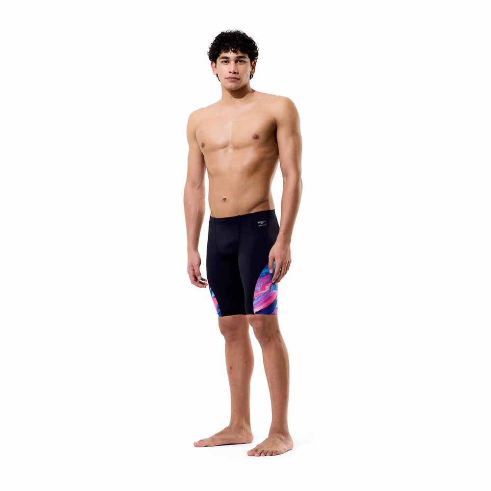 Speedo men's spliced printed jammer in Brushy Glitch-Black with bold, colorful geometric patterns for competitive swimming.
