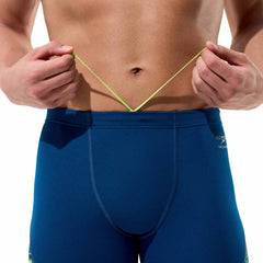 Speedo men's spliced printed jammer in Mirage Time-Denim Teal, featuring bold patterns and a streamlined swimwear design.