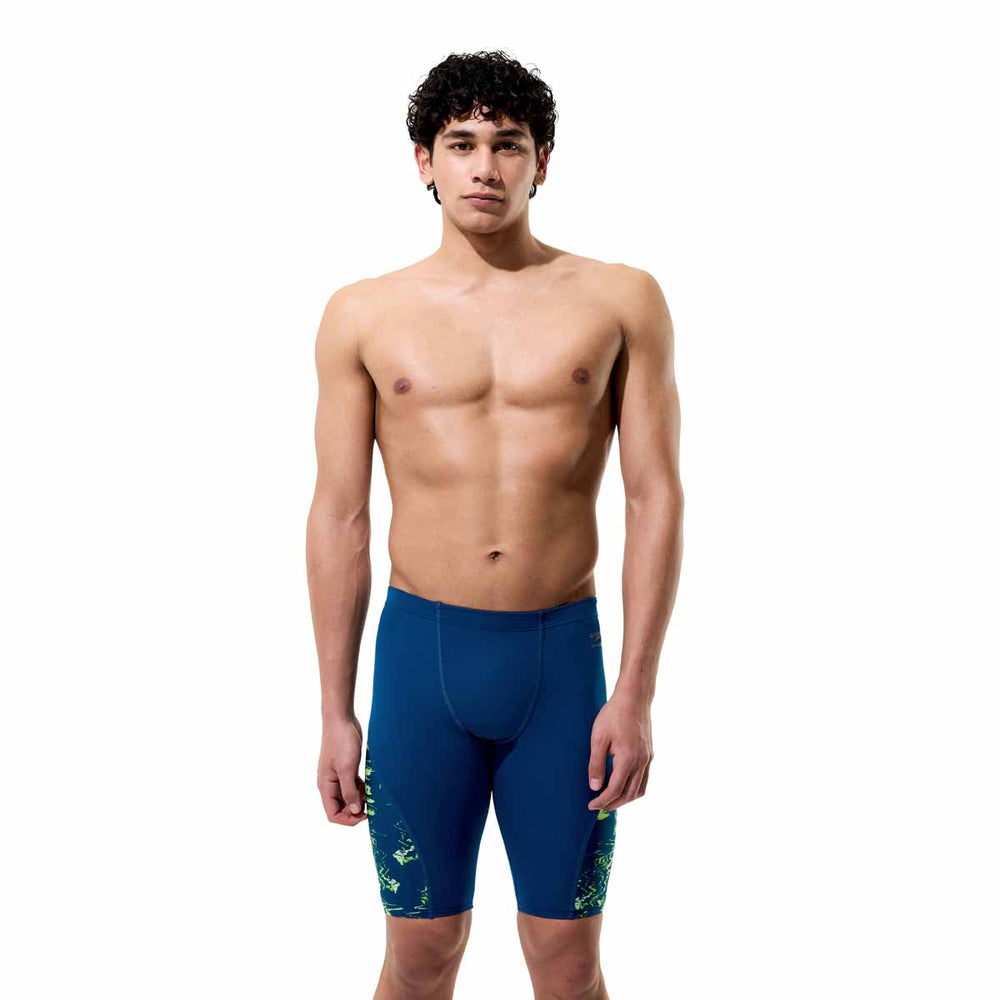 Speedo men's spliced printed jammer in Mirage Time-Denim Teal with vibrant geometric patterns for competitive swimming.