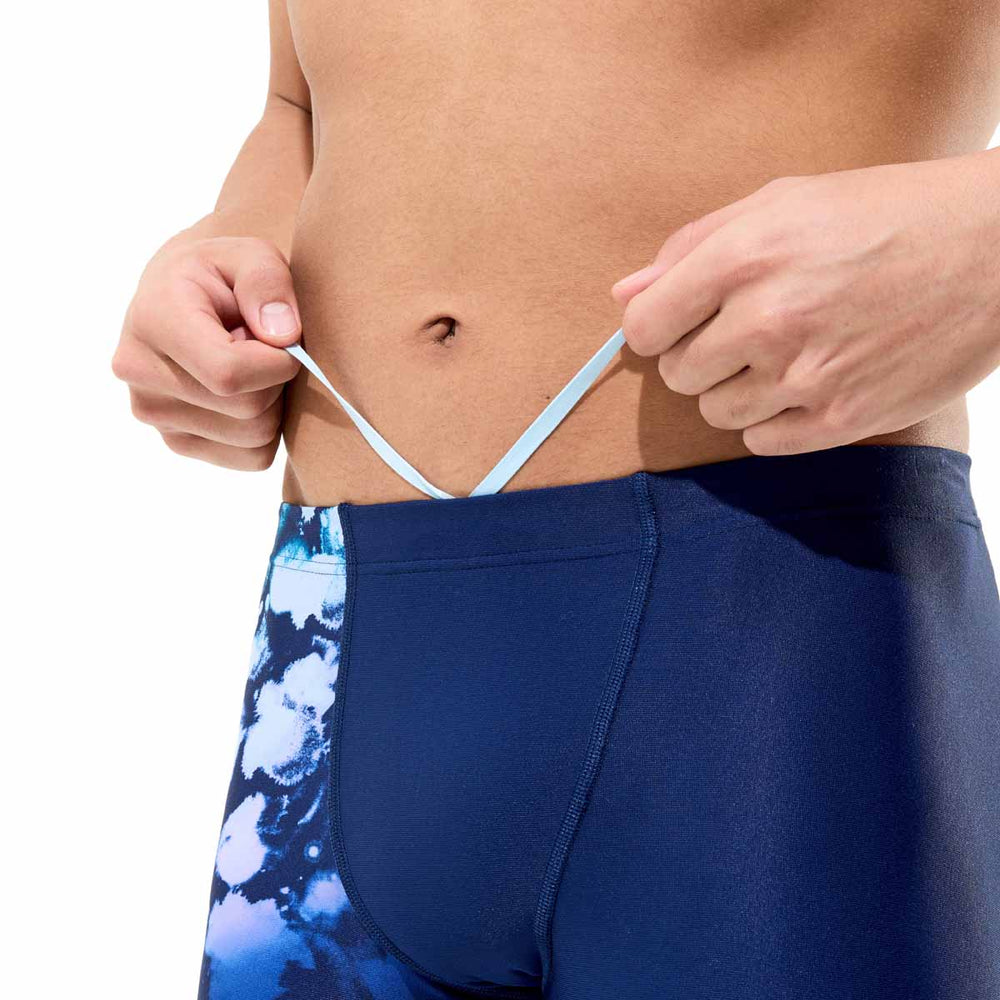 Speedo men's printed jammer swimsuit in Moonglow Smoke and Navy with bold placement design, ideal for competitive swimming.