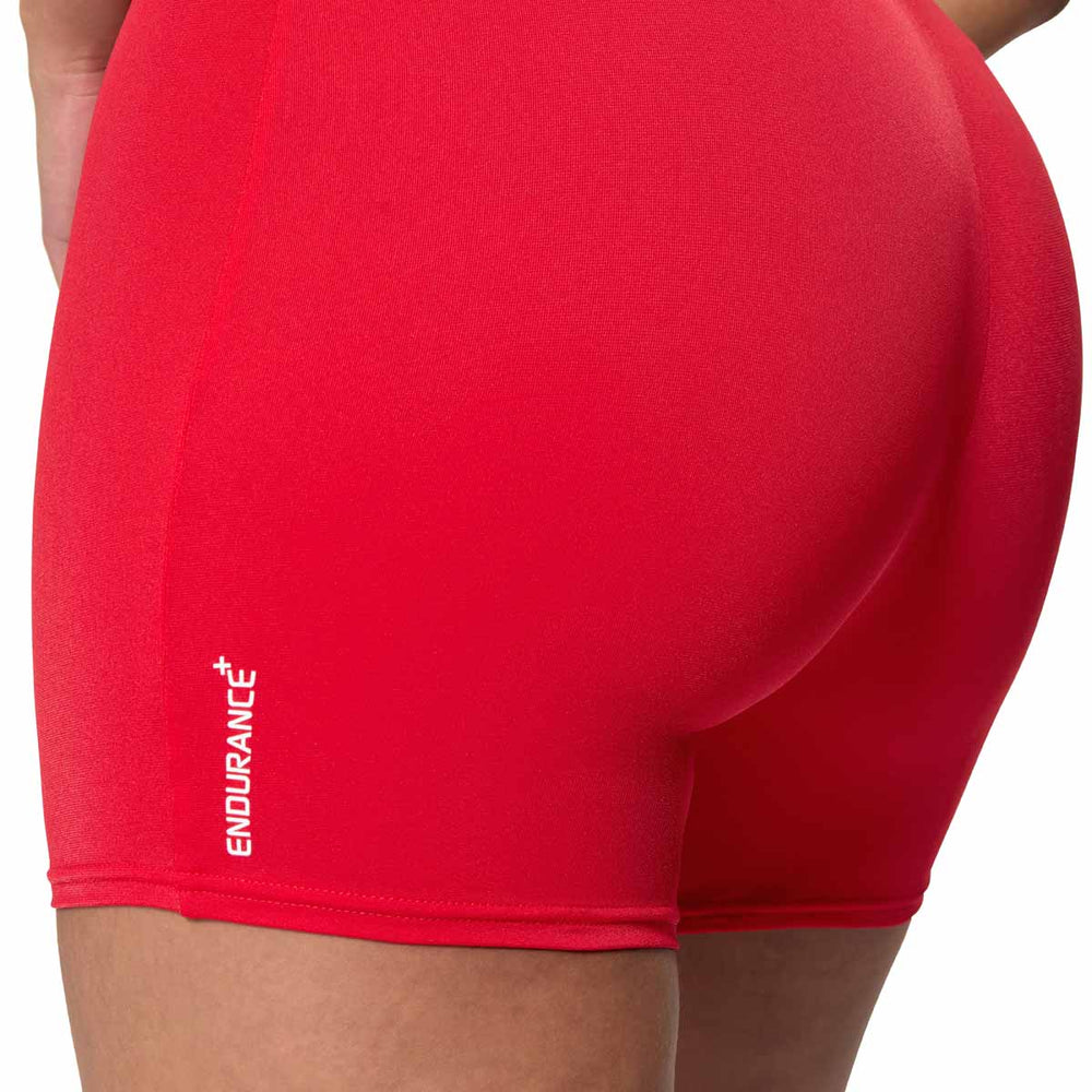 Speedo women's Endurance+ legsuit in high risk red, featuring a sleek, form-fitting swimwear design with full coverage.