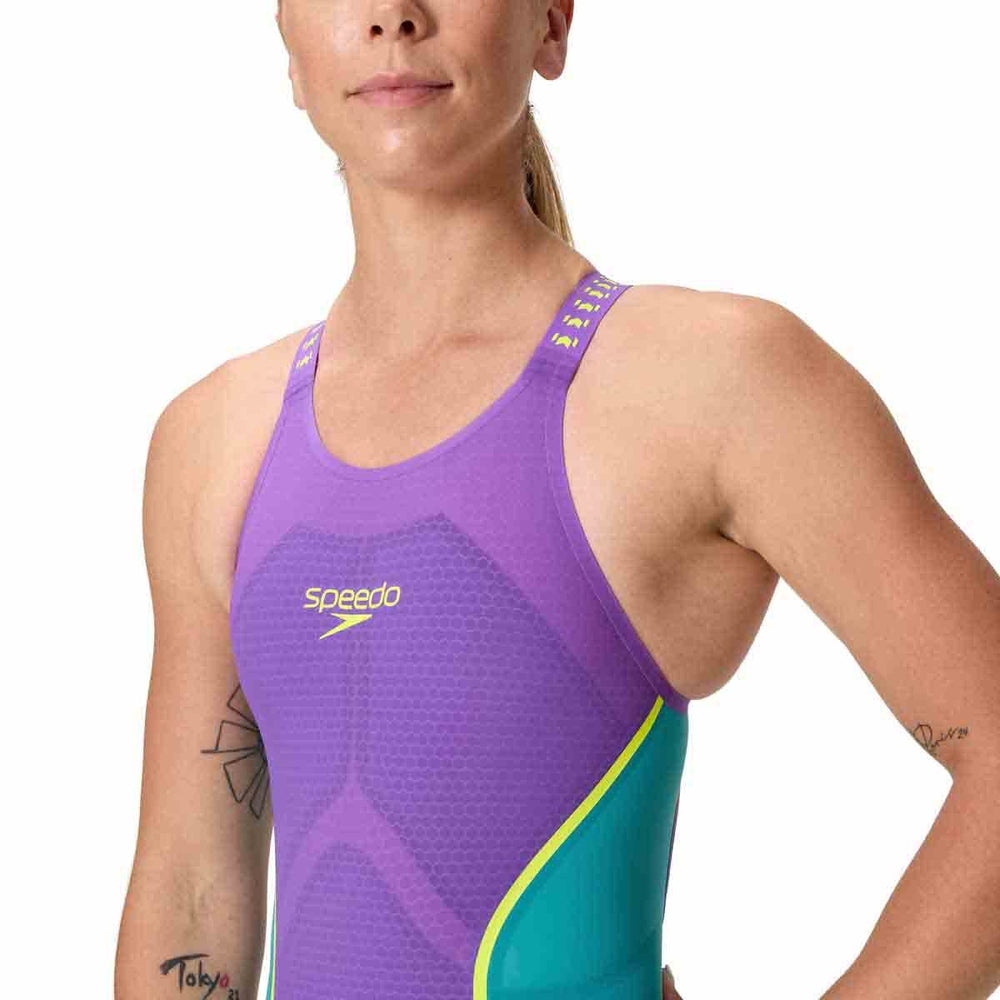 Speedo Women's Fastskin LZR Pure Intent 2.0 openback kneesuit in grape, blue, and yellow, featuring sleek swimwear design.