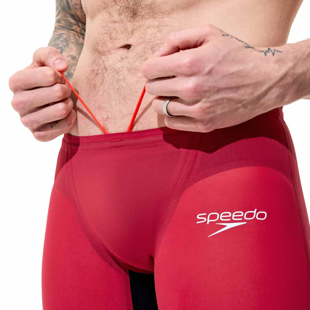 Speedo men's Fastskin LZR Pure Valor 2.0 jammer in Regal Red and black, featuring a sleek, streamlined design for competitive swimming.