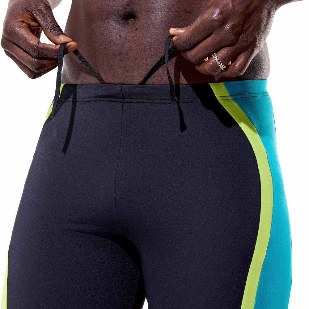 Speedo men's solid splice jammer in anthracite and hyper teal, close-up of the snug fit and vibrant color design