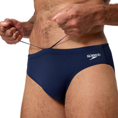 Speedo men's Endurance+ logo briefs in peacoat color, 2.5-inch swim briefs with branded logo and comfortable fit.