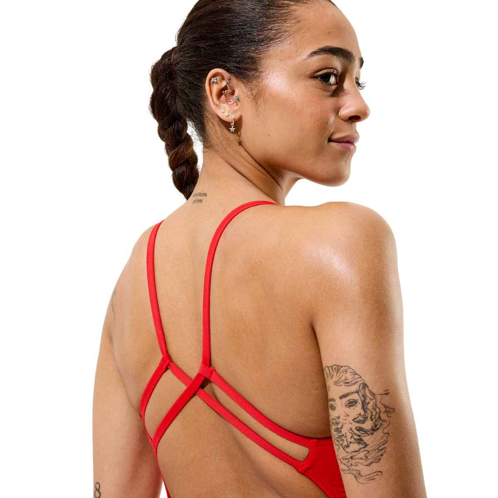 Speedo women's solid Endurance+ Max Strappy Back swimsuit in team red, showcasing the sleek, supportive design for swimming.