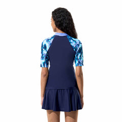 Navy Speedo women's swim skirt with built-in shorts, lightweight and comfortable for swimming and beachwear.