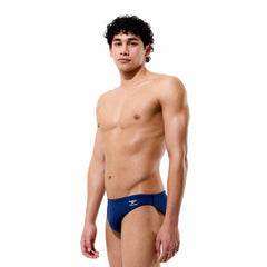 Speedo men's solid navy Endurance+ Max brief, close-up of navy swimming briefs with sleek design and elastic waistband.