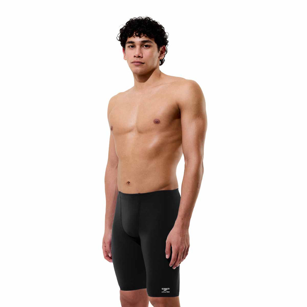 Speedo men's solid Endurance+ Max jammer in black, close-up view of the sleek, fitted swimwear designed for competitive swimming.