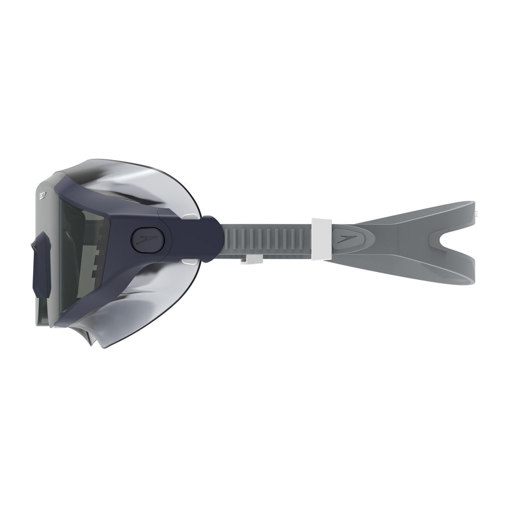 Speedo Aquapulse Pro swimming goggles in peacoat and smoke color, featuring adjustable straps and clear lenses.