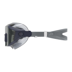 Speedo Aquapulse Pro swimming goggles in peacoat and smoke color, featuring adjustable straps and clear lenses.