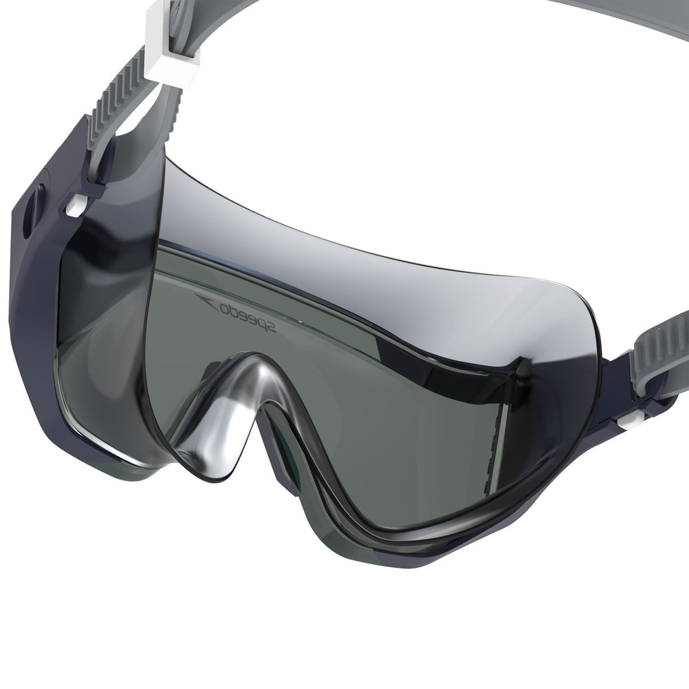 Speedo Aquapulse Pro swimming goggles in peacoat and smoke color, featuring adjustable straps and a sleek, low-profile design.
