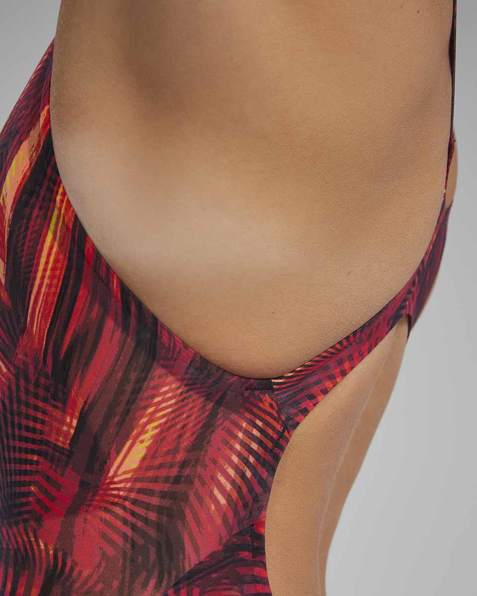 TYR Women's Avictor 2.0 Helux open-back kneesuit in red and orange, designed for competitive swimming.