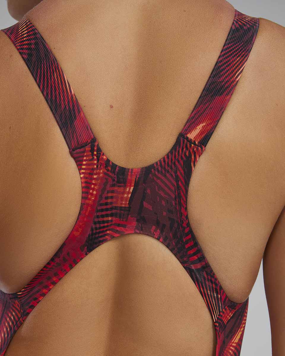 TYR Women's Avictor 2.0 Helux open-back kneeskin swimsuit in red and orange, featuring a sleek design and open back for swimming.