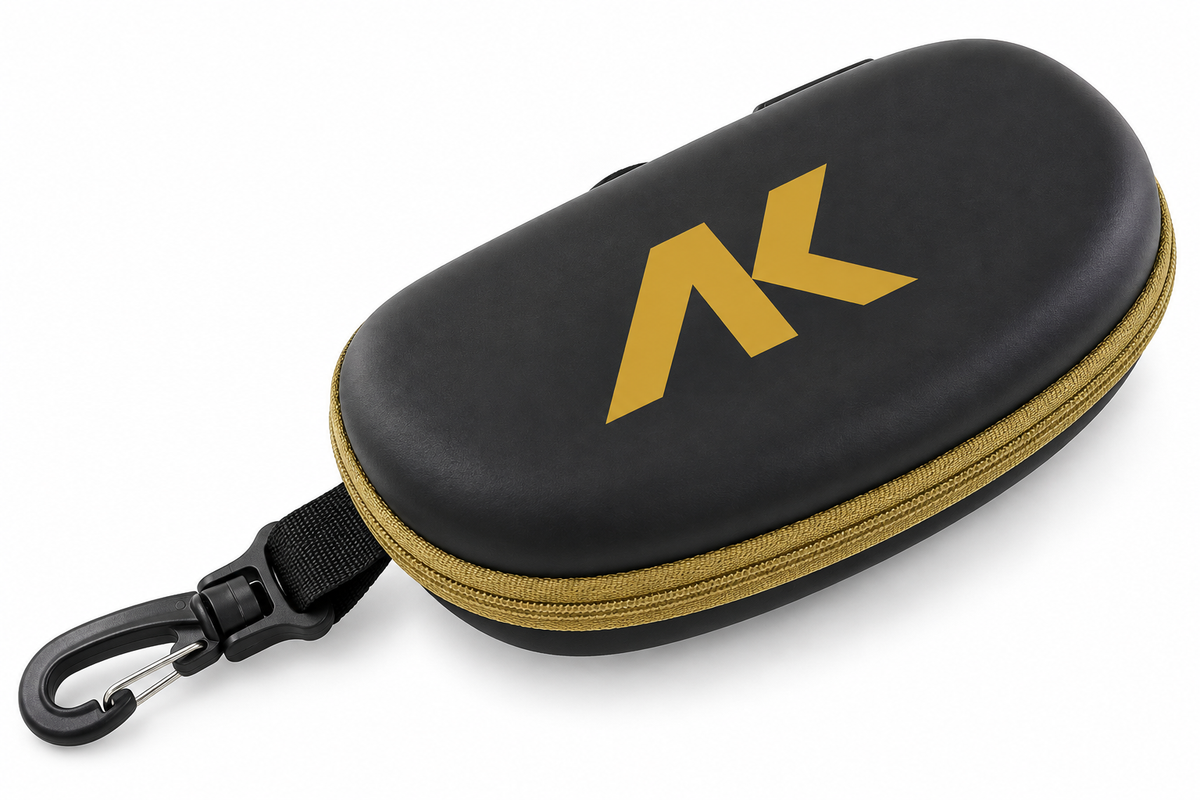 Black and gold AK goggle case with protective padding and zipper closure, designed for secure storage of ski or snowboard goggles.