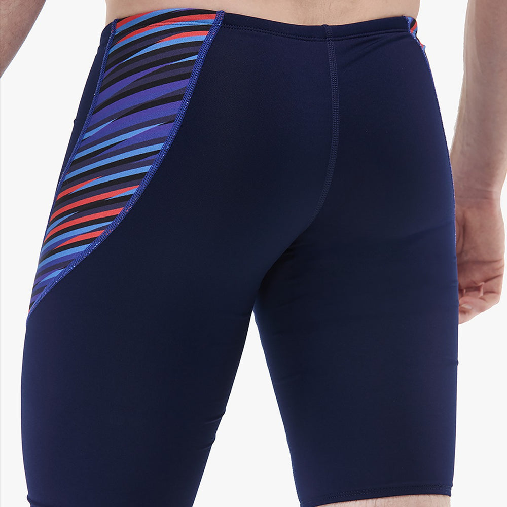 TYR men's Zollner Curve Splice jammer in navy, red, and blue with a sleek design, suitable for competitive swimming.