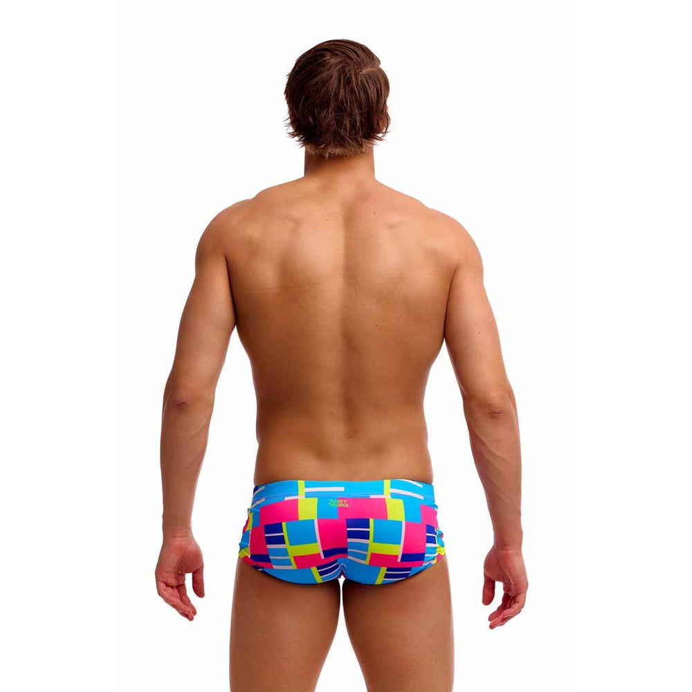 Funky Trunks men's Blok Tok classic trunks in multi-color with bold geometric patterns, displayed on a model.