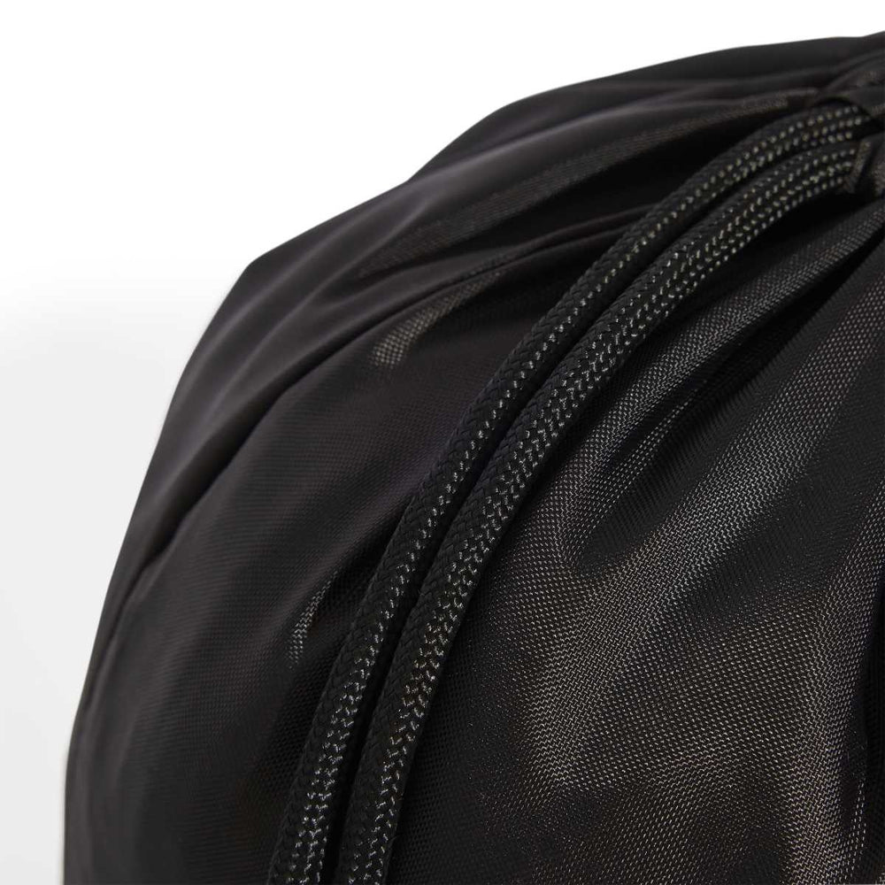 Black Adidas Linear gym sack used as a swim bag, featuring the Adidas logo and durable fabric with a simple, functional design.