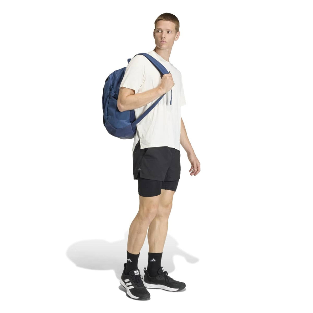 Adidas PrimeLift Backpack in Night Marine color, side view showing spacious main compartment and sturdy straps.
