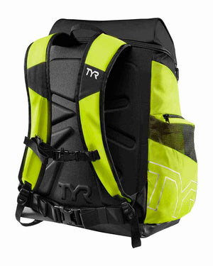 Bright lime TYR Alliance 45L backpack with multiple compartments and sturdy straps, designed for sports and travel.