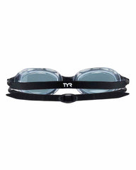 TYR Nest Pro swimming goggles in smoke color, with adjustable straps and clear lenses, designed for competitive swimming.