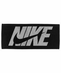 Nike Jacquard Graphic Towel in black and white with bold Nike logo, featuring a textured jacquard pattern on soft cotton fabric.
