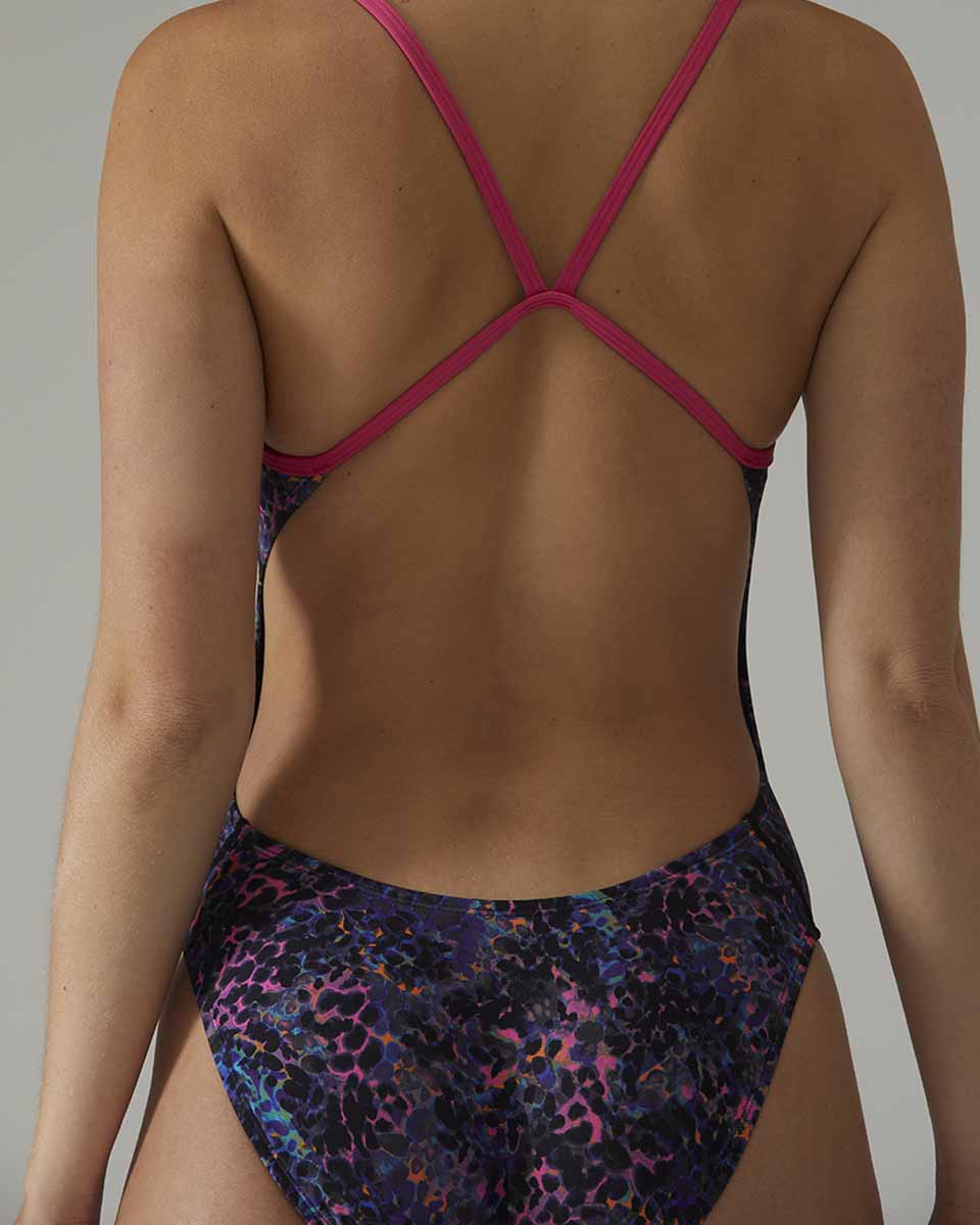 TYR women's stipple cutout swimsuit in petunia color, featuring a stylish design with cutouts and supportive fit.