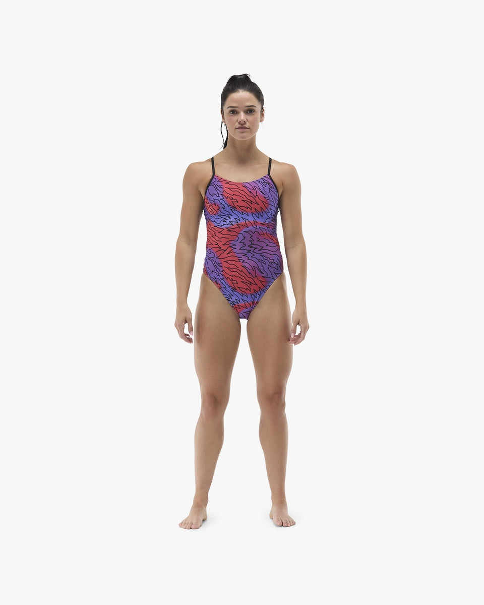 TYR women's Hodori Cutoutfit swimsuit in orange and purple, featuring a stylish cutout design and sporty fit.