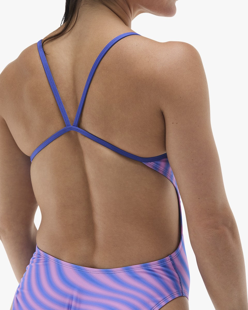 TYR women's Bezold cutout swimsuit in blue and pink featuring a sleek, athletic design and stylish cutouts for swimming and beachwear.