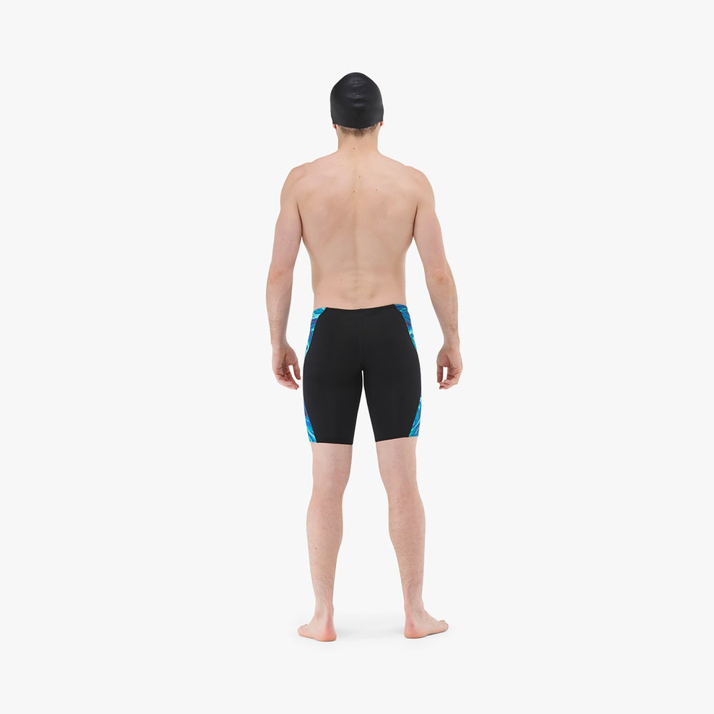 TYR men's Olea jammer in blue and green, close-up view showing the snug fit and vibrant color pattern.