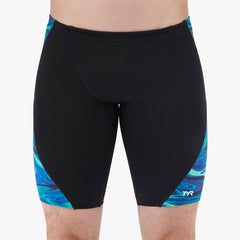 TYR men's Olea jammer in blue and green, close-up view showing the fitted swimwear fabric and colorful design.