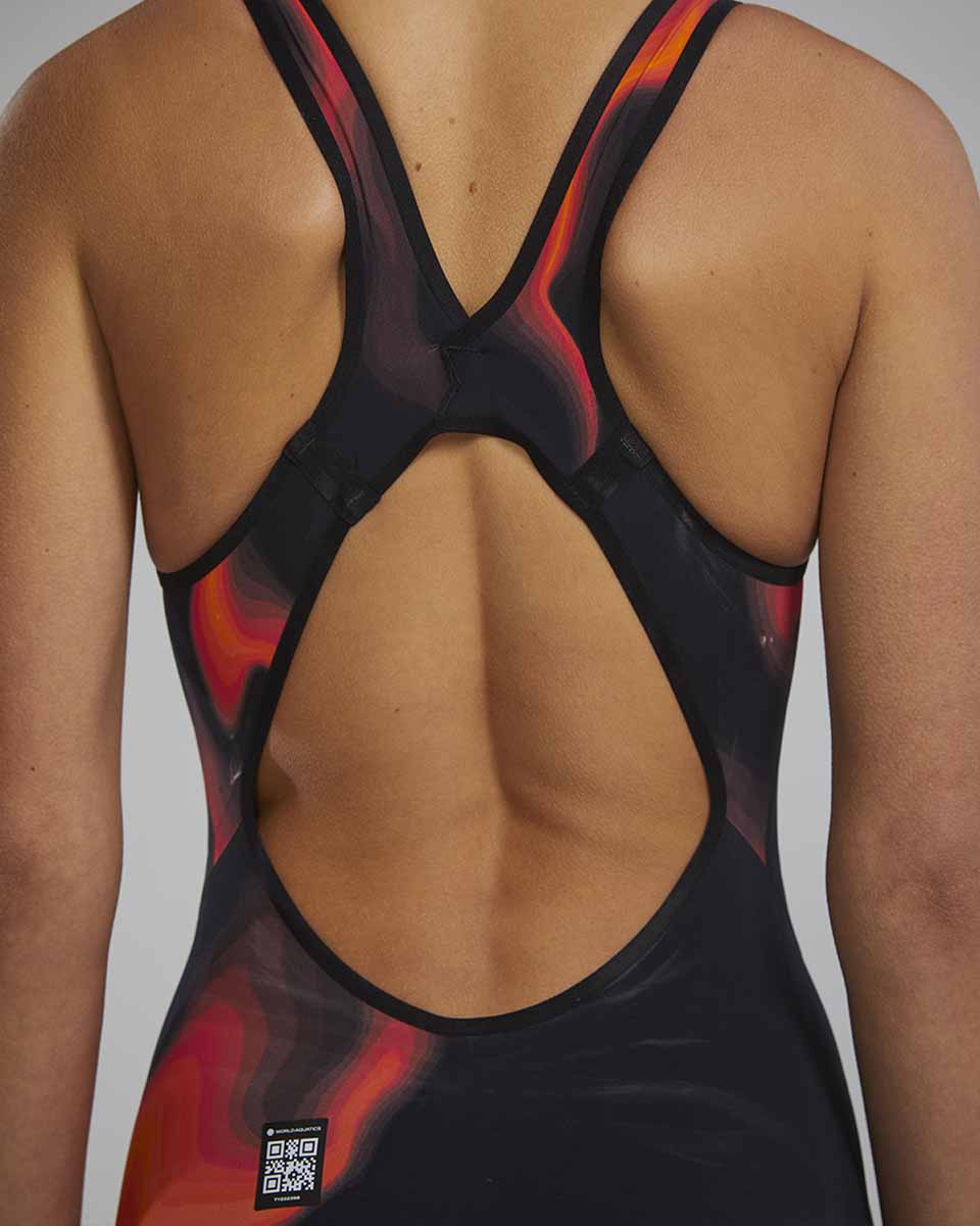 TYR Womens Venzo Infrared Openback Kneeskin in fire color, sleek swim kneesuit with open back design for competitive swimming.