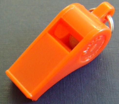 Orange Acme Thunderer 660 whistle with a metal body and ergonomic design, ideal for sports and outdoor activities.