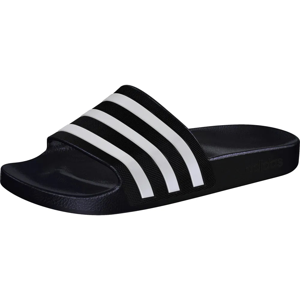 Black Adidas Adilette Aqua Slides worn with sports socks, casual slip-on sandals for lounging or beachwear.