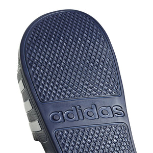 Navy blue Adidas Adilette Aqua slides with textured footbed and wide strap, designed for comfort and casual wear.
