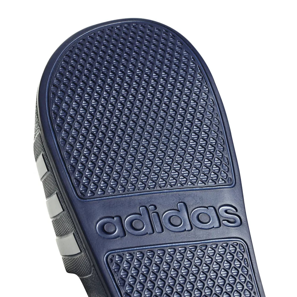 Navy blue Adidas Adilette Aqua slides with textured footbed and wide strap, designed for comfort and casual wear.