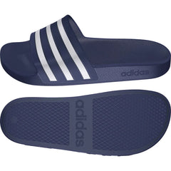 Navy blue Adidas Adilette Aqua Slides with textured footbed and slip-on design, paired with sports socks.