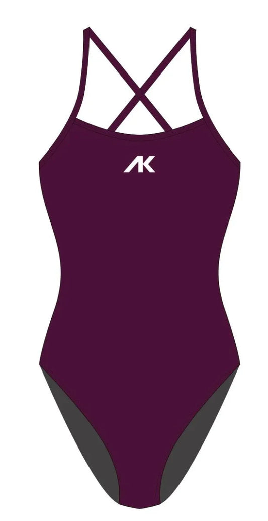 Women’s AK Tieback Swimsuit in Cabernet, featuring a stylish back-tie design, displayed on a model in a summery setting. 618