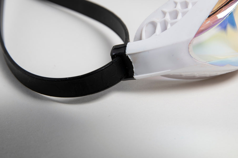 Arena Airspeed Mirror goggles in white and copper with reflective lenses, designed for competitive swimming.