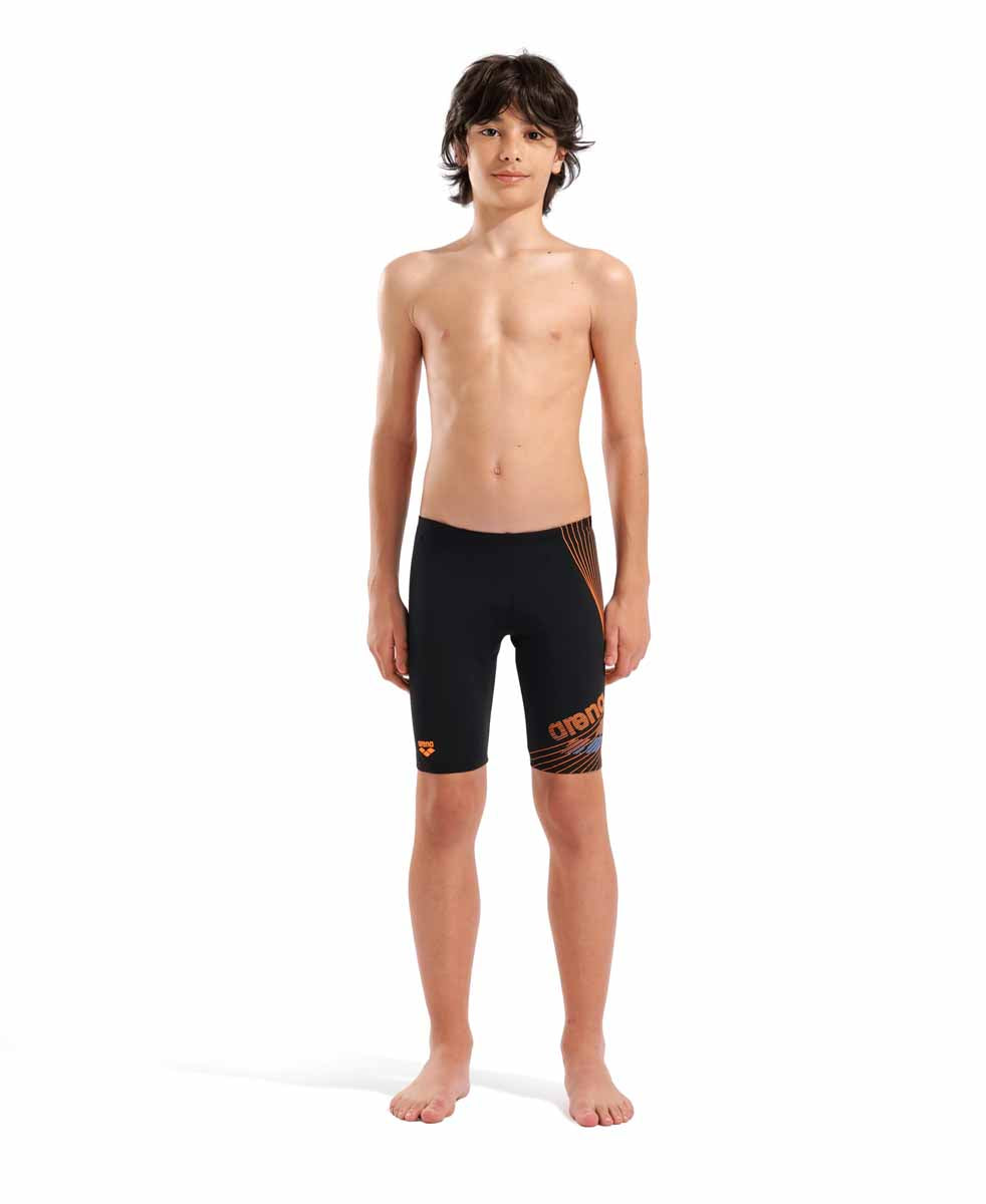 Arena boys' swim jammer in black with orange and turquoise design, featuring the athletic fit and branding on the fabric.