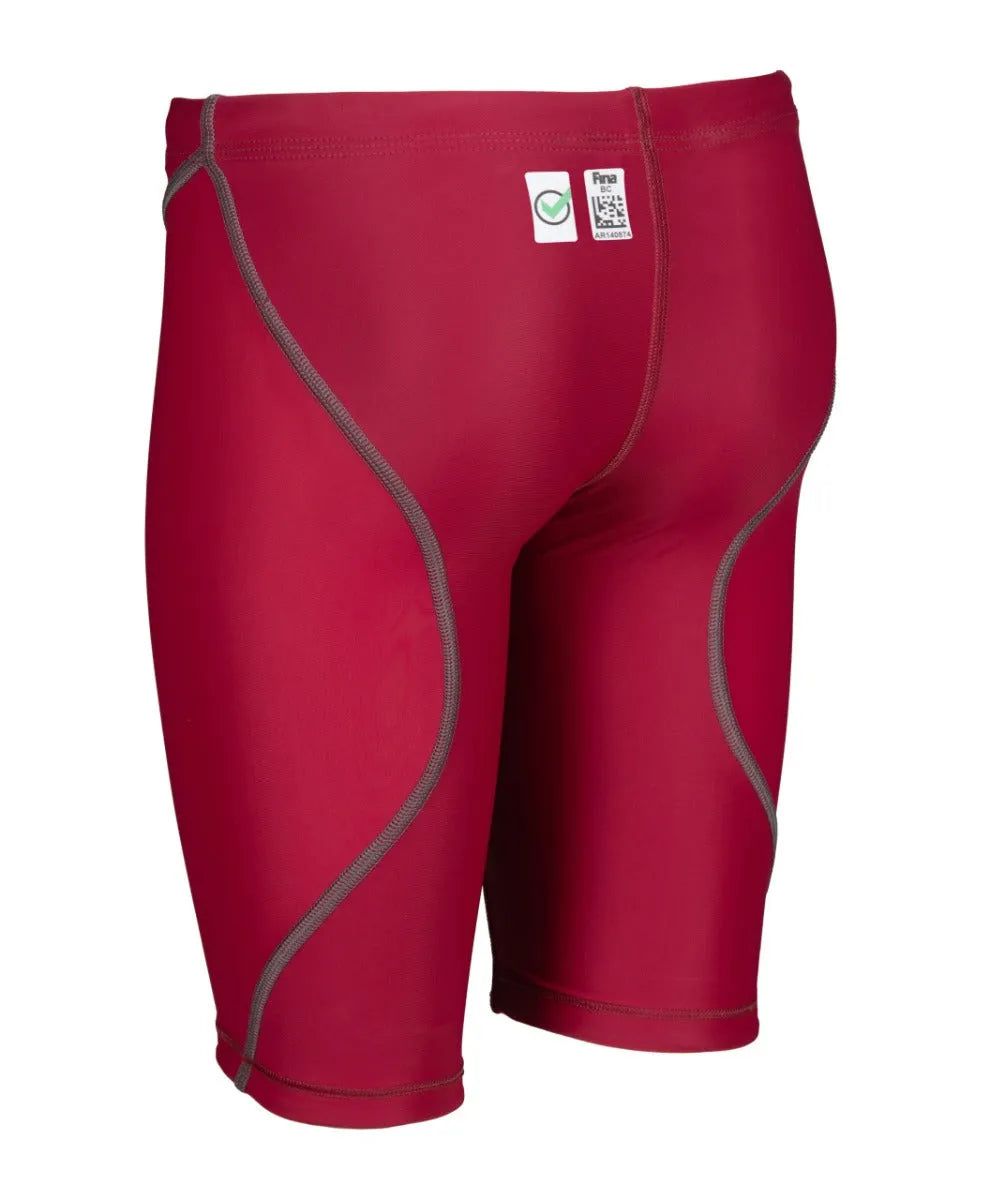 Arena Boys Powerskin ST Next Jammer in deep red, close-up of the high-performance swim jammer for young swimmers.