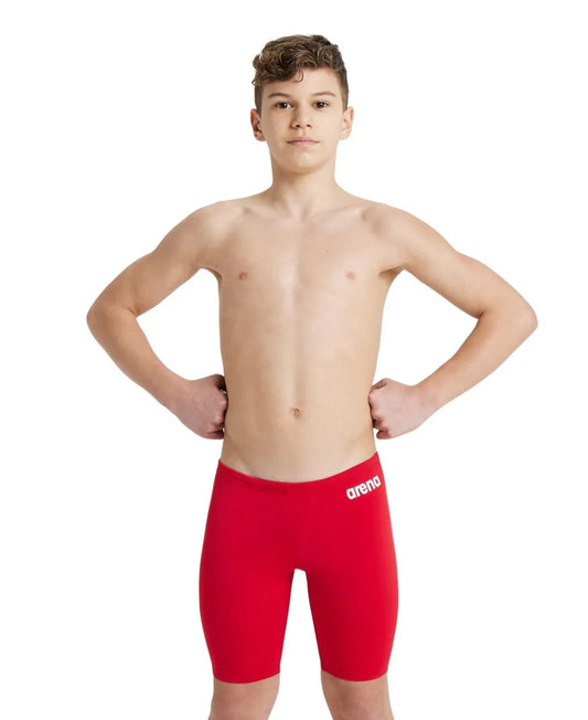 Arena boys' team swim solid jammer, navy blue, stretchy swimwear designed for competitive swimming and training. 981