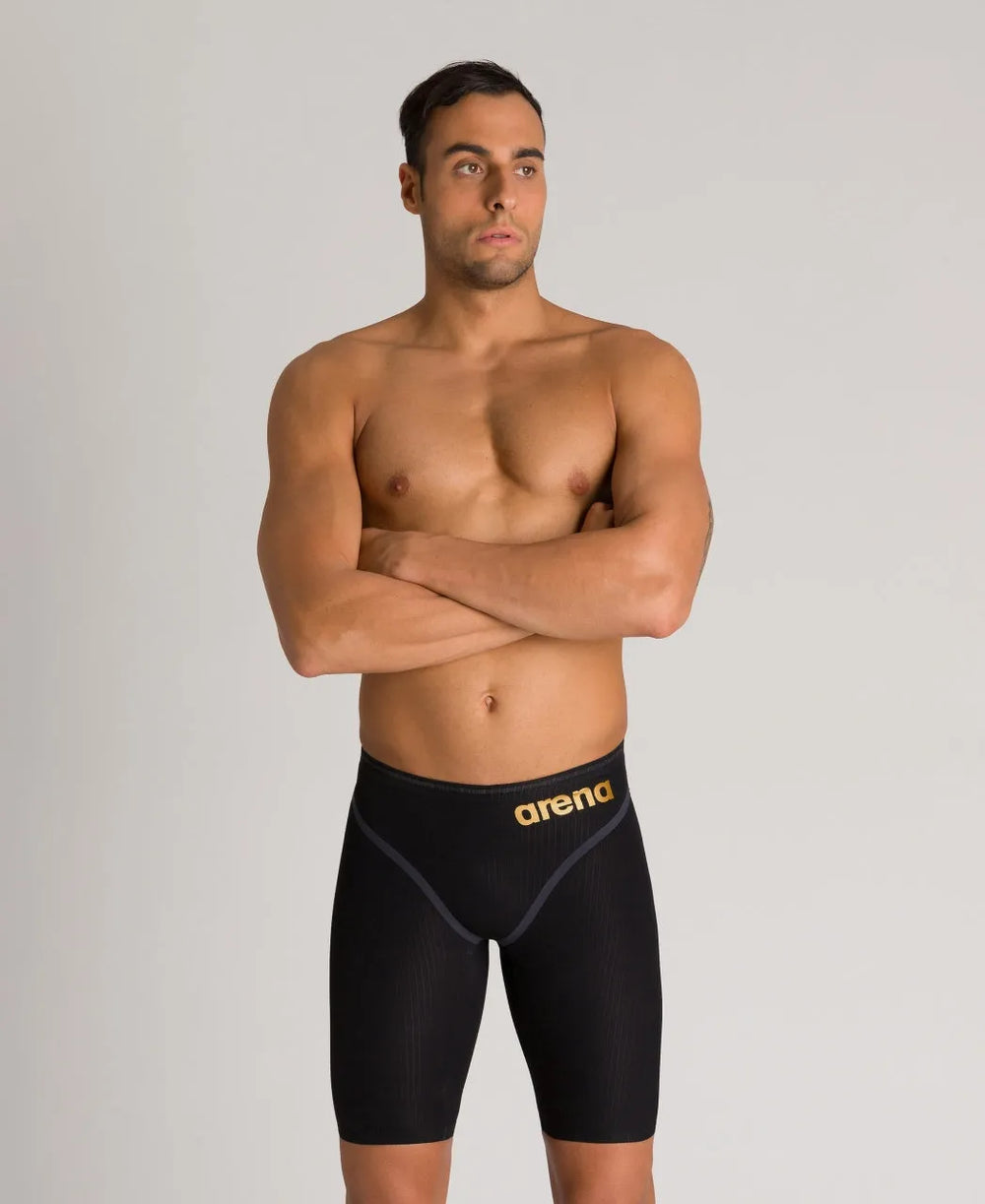 Black Arena Men's Carbon Core FX Jammers for competitive swimming, featuring sleek design and durable fabric.