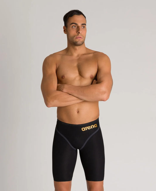 Black Arena Men's Carbon Core FX Jammers for competitive swimming, featuring sleek design and durable fabric. 1047